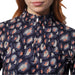 Daily Sports Ladies Bezons Long Sleeve Polo Shirt in an all-over print and featuring quarter zip