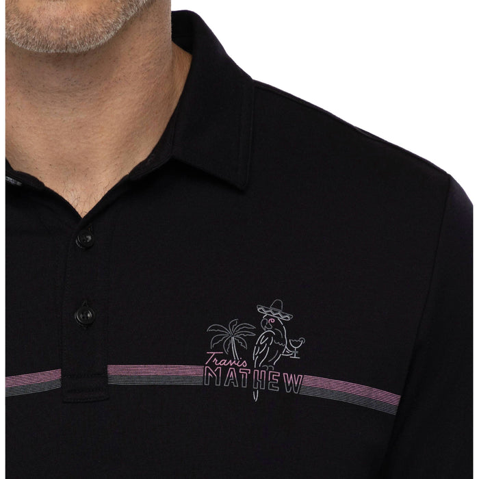 Travis Mathew High Surf Polo Shirt collar in black with chest stripes in pink and grey. Features a Travis Mathew Parrot Logo